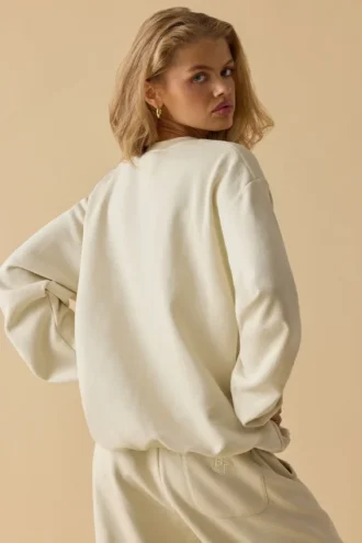 Oversized tröja med rund hals i benvit