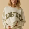 Oversized tröja med rund hals i benvit