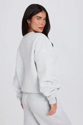 Oversized tröja med rund hals i gråmelerat