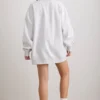 Oversized tröja med rund hals i gråmelerat
