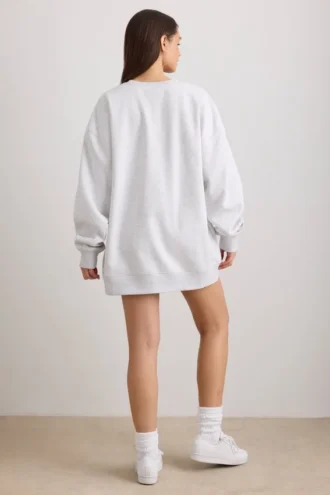 Oversized tröja med rund hals i gråmelerat