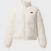 Quiltad puffjacka i corduroy i färgen Ivory