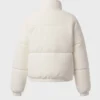 Quiltad puffjacka i corduroy i färgen Ivory