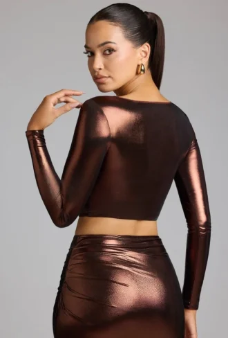 Rana crop top i metalliskt jersey med djup urringning i kopparbrons