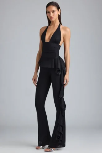 Reese Metallic Ruffle Low-Rise Flared Trousers i svart