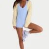 Ribbstickad kort bolero i citrongult