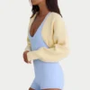 Ribbstickad kort bolero i citrongult