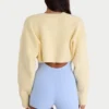 Ribbstickad kort bolero i citrongult