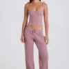 Ribbstickad linne med knytning i mauve