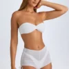 Rocas genomskinliga, rynkade minishorts i vitt