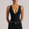 Rumi Deep Plunge Halterneck Bodys i svart