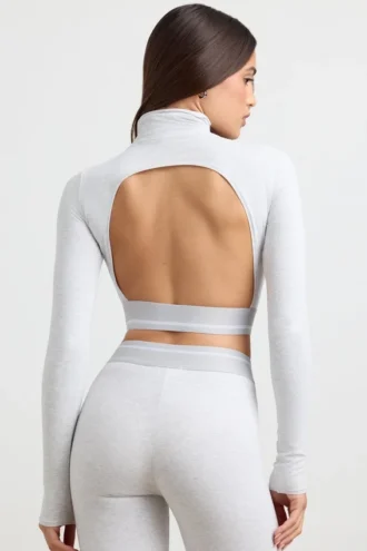 Rygglös långärmad crop top med hög hals i gråmelerad