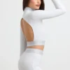Rygglös långärmad crop top med hög hals i gråmelerad