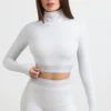 Rygglös långärmad crop top med hög hals i gråmelerad