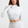 Rygglös långärmad crop top med hög hals i gråmelerad