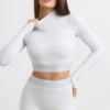 Rygglös långärmad crop top med hög hals i gråmelerad