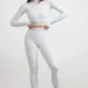 Rygglös långärmad crop top med hög hals i gråmelerad