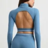 Rygglös långärmad crop top med hög hals i stålblått