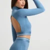 Rygglös långärmad crop top med hög hals i stålblått