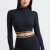 Rygglös långärmad crop top med turtleneck i svart
