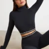 Rygglös långärmad crop top med turtleneck i svart