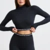 Rygglös långärmad crop top med turtleneck i svart