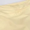 Rynkade minishorts i citrongul melerad