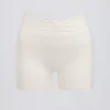 Rynkade minishorts i ivory marl
