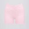 Rynkade minishorts i ljusrosa melerad