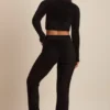 Safia Fluffiga stickade byxor med vida ben i svart