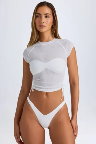 Santana genomskinlig, rynkad, kort T-shirt i vitt