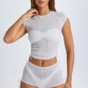 Santana genomskinlig, rynkad, kort T-shirt i vitt