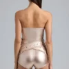 Sasha metallic-denim-korsettplaysuit med bälte i champagne
