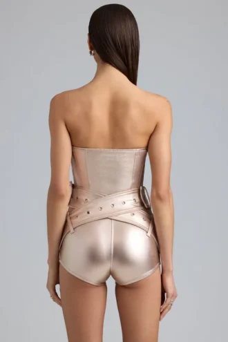 Sasha metallic-denim-korsettplaysuit med bälte i champagne