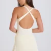 Skort i ribbstickat med knytning i färgen Cream