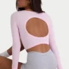 Sömlös, mjuk ribbad crop top med utskärningar i puderrosa