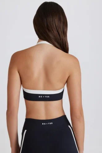 Soft Active sport-BH med vridet framsida och halterneck i svart