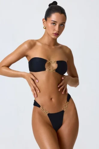 Sunny Isles Bandeau-bikinitopp med utskärningar och dekorationer i svart
