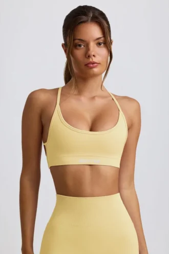 Super Sculpt sömlös rygglös sport-BH i smörgul