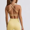 Super Sculpt sömlös rygglös sport-BH i smörgul
