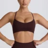 Super Sculpt sömlös sport-BH med korsad rygg i choklad