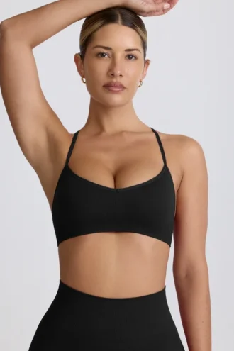 Super Sculpt sömlös sport-BH med korsad rygg i svart