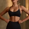 Super Sculpt sömlös sport-BH med korsad rygg i svart