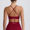 Super Sculpt sömlös sport-BH med korsade band i ryggen i burgundy