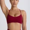 Super Sculpt sömlös sport-BH med korsade band i ryggen i burgundy