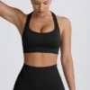 Super Sculpt sömlös sport-BH med T-rygg i svart