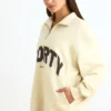 Sweatshirt med kvartslås i benvit