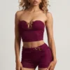 Tarni bandeau-crop-top med metalldetaljer i bärlila