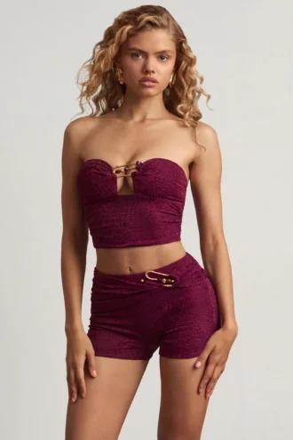 Tarni bandeau-crop-top med metalldetaljer i bärlila