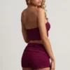 Tarni bandeau-crop-top med metalldetaljer i bärlila